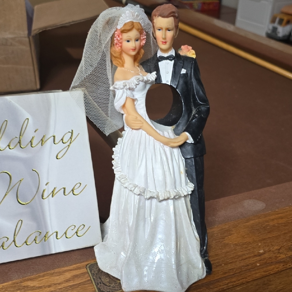 Elegant Wedding Cake Topper with Bride and Groom